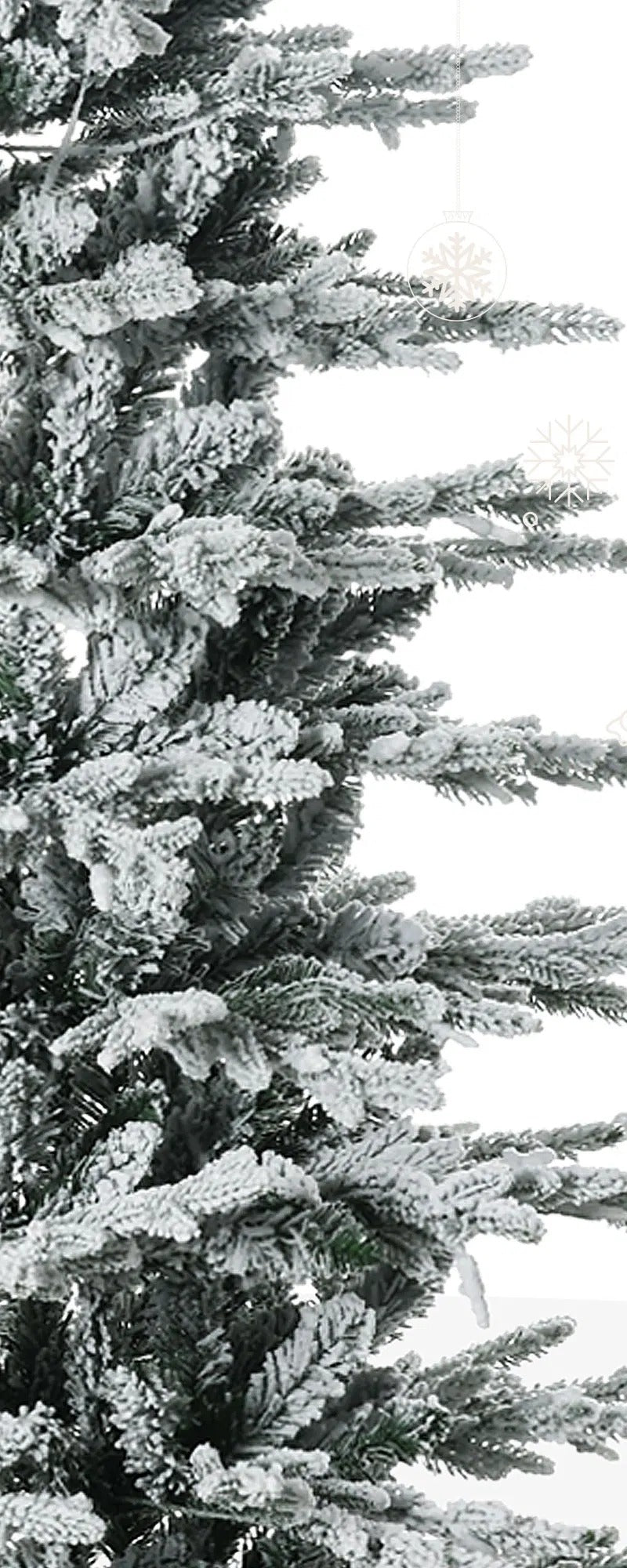 Tall snow-flocked tree with clear lights