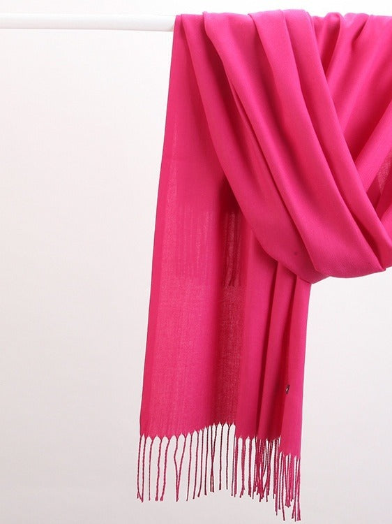 Woman in soft fringed scarf