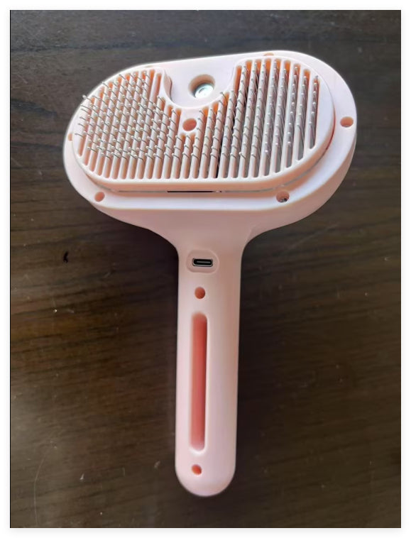 Pet slicker brush with mist spray