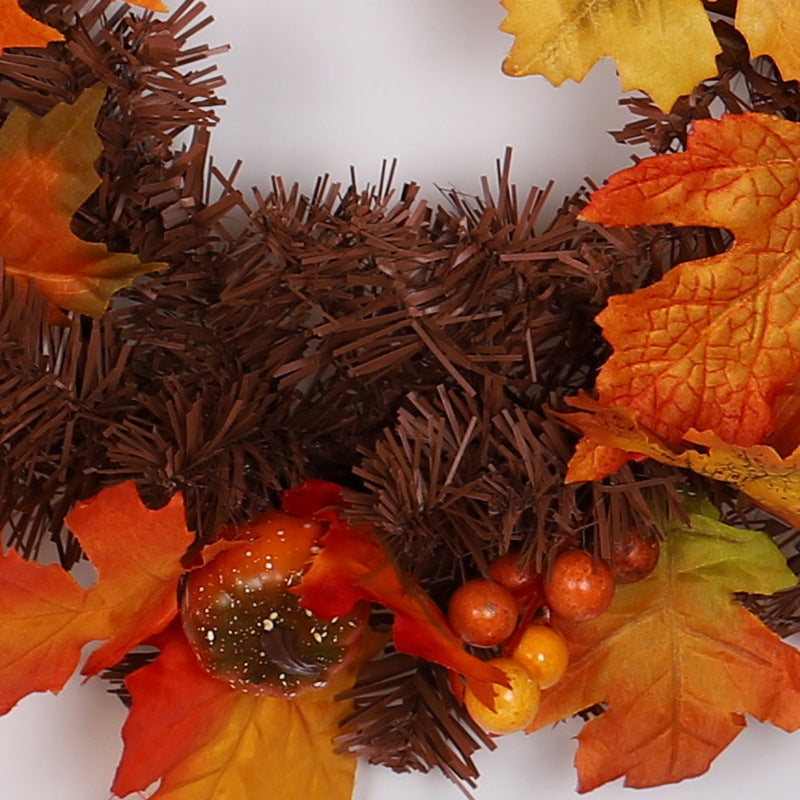 Autumn maple leaf garland on a mantel
