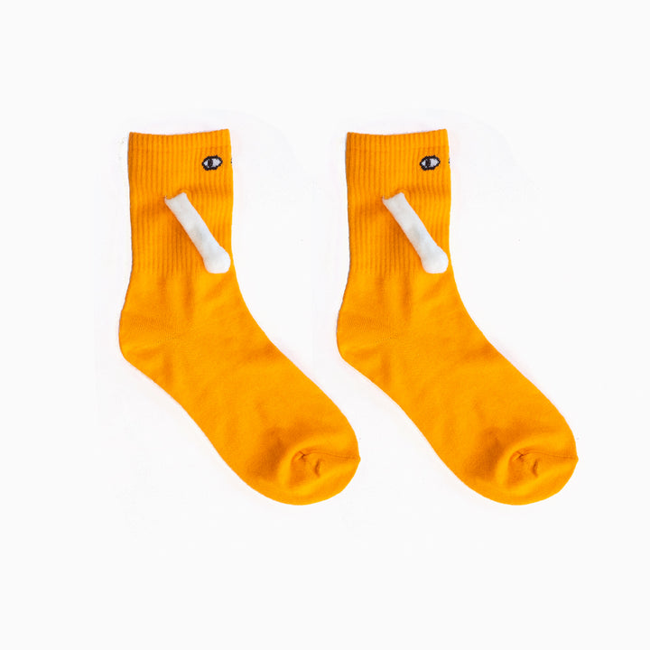 Two socks with magnetic hands holding each other