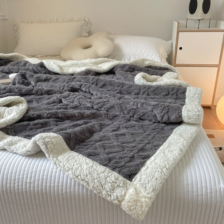 Cream cable knit blanket with sherpa border