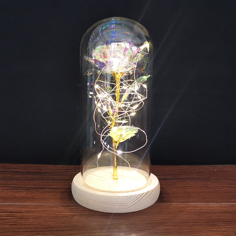 Enchanted rose in a glass dome with LED lights