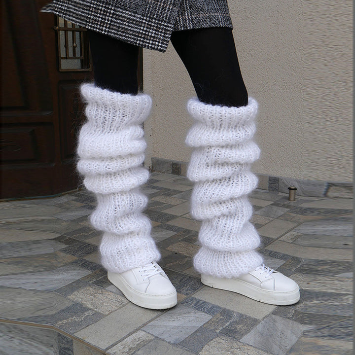 Chunky slouchy knitted leg warmers over boots