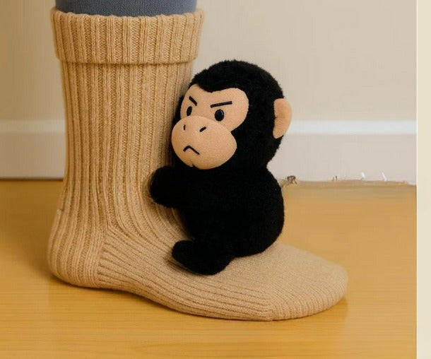Knit socks with 3D crochet sloth