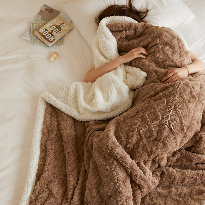 Tufted fleece throw draped over sofa