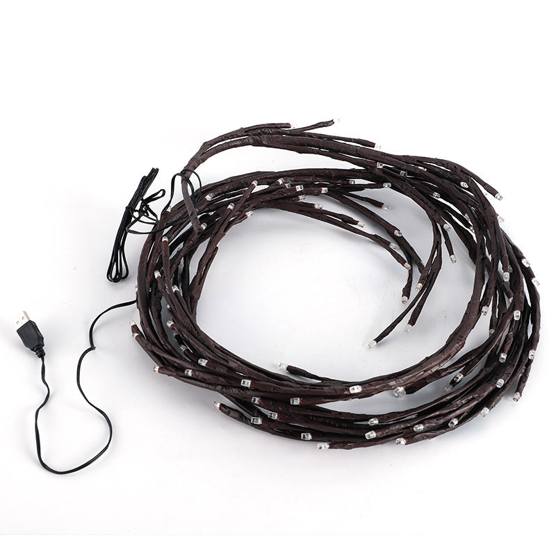 Warm white LED branch light on wall