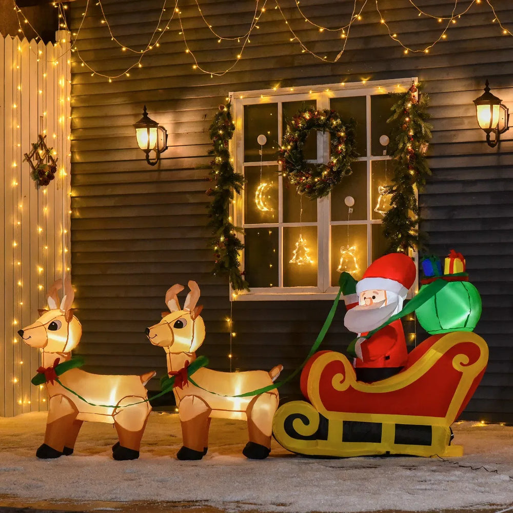 Inflatable Santa in sleigh with two reindeer