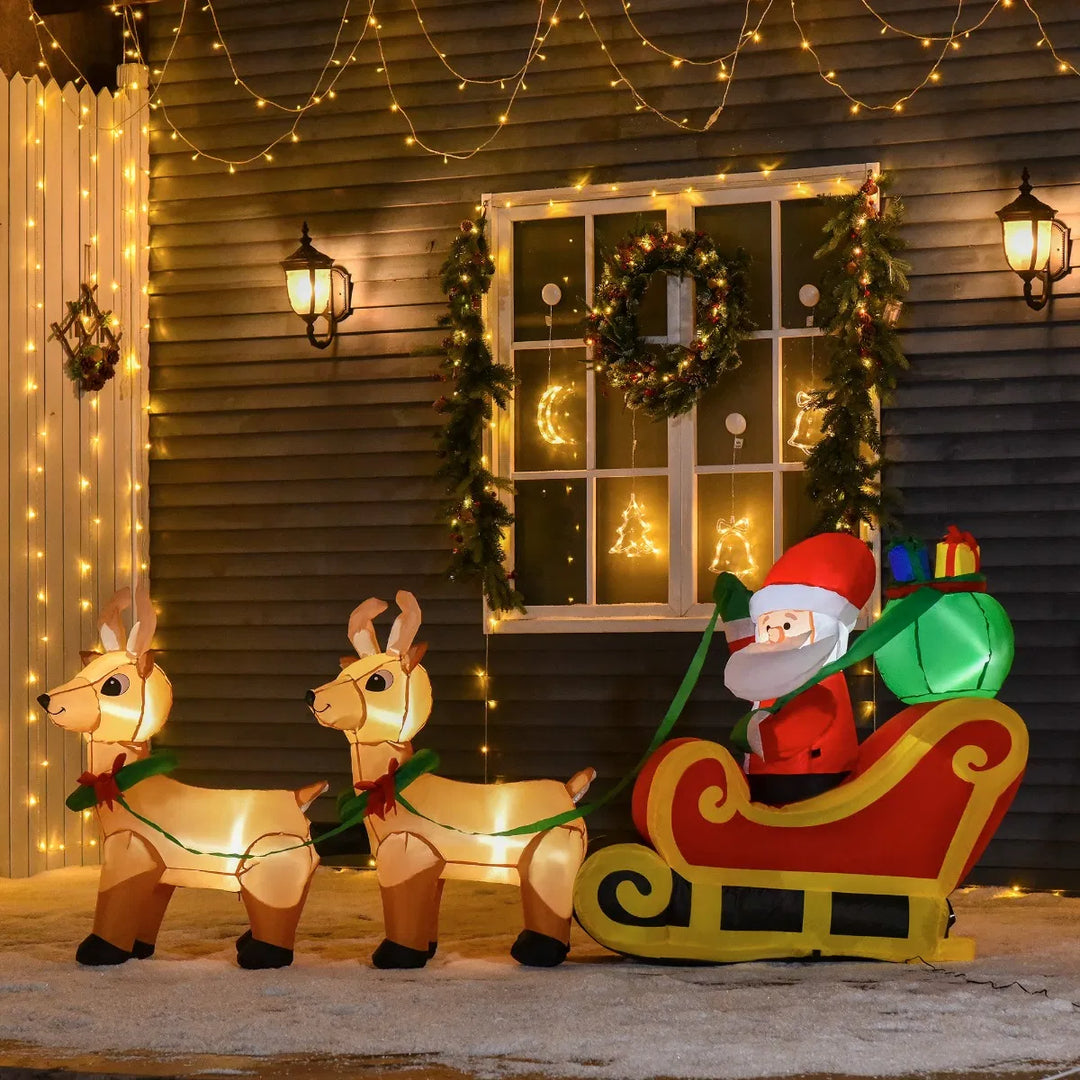 Inflatable Santa in sleigh with two reindeer
