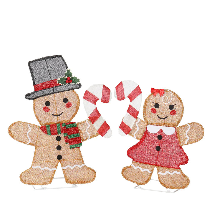 Two light-up gingerbread figures with candy canes