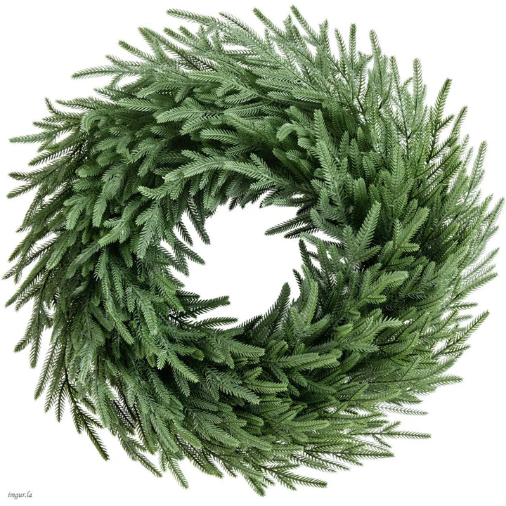 Large green pine wreath on vine base