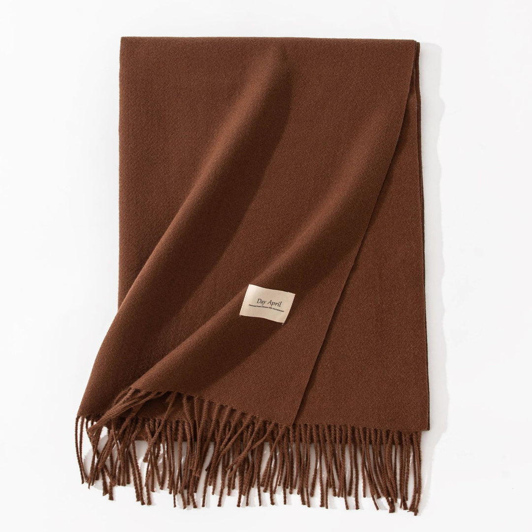 Woman wearing wide soft shawl scarf