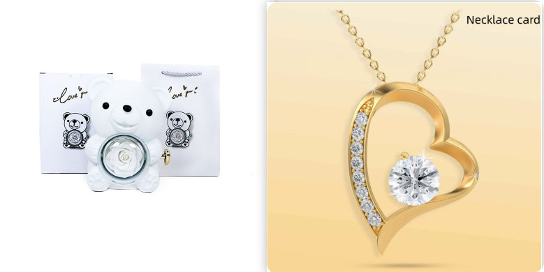 Rotating teddy bear jewellery box with eternal rose
