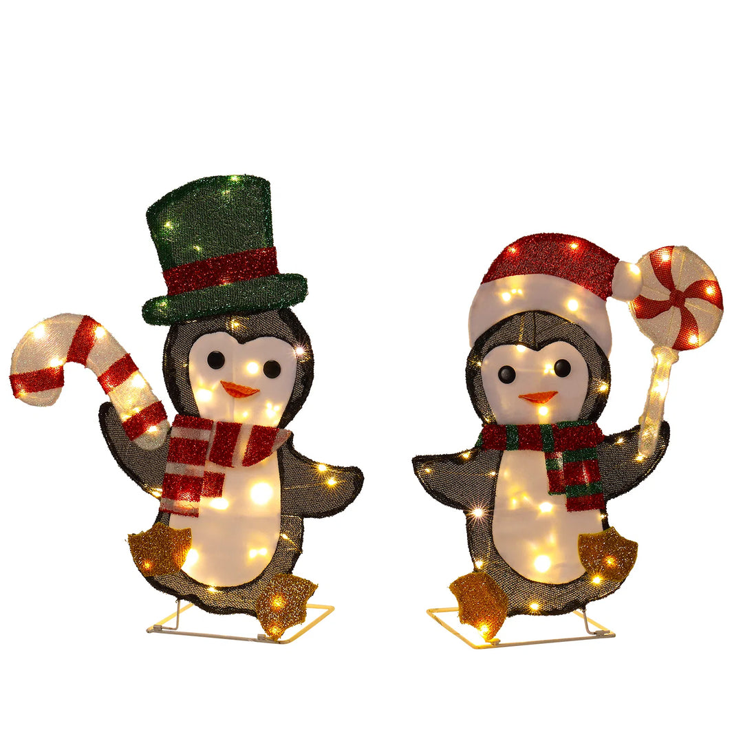 Two light-up Christmas penguins with candy canes