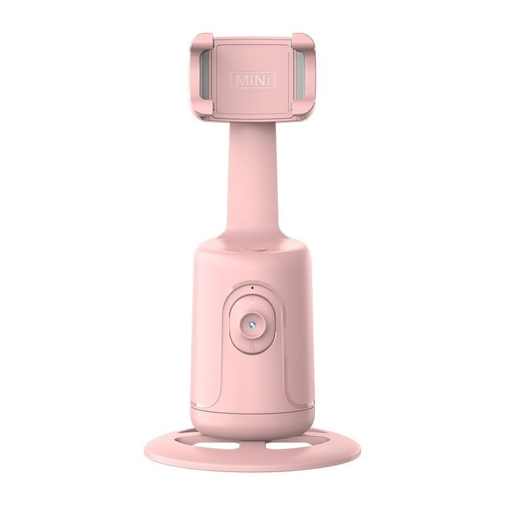 Face-tracking phone holder rotating with phone