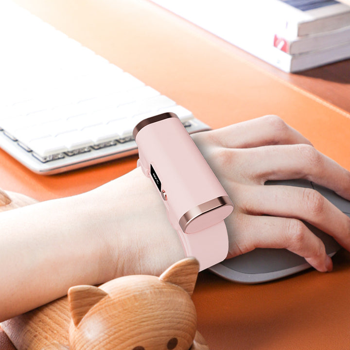 Pink bracelet hand warmer on wrist