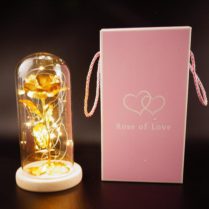 Enchanted rose in a glass dome with LED lights