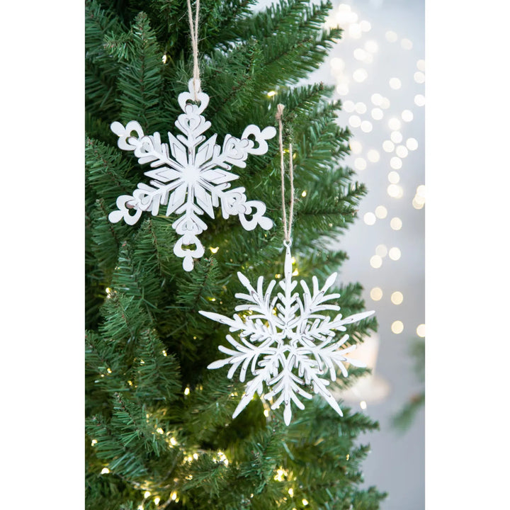 White metal snowflake hanging decorations with rope