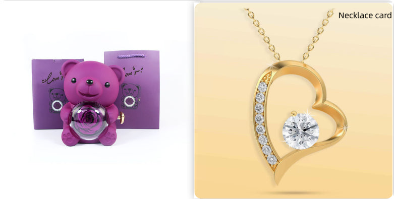 Rotating teddy bear jewellery box with eternal rose