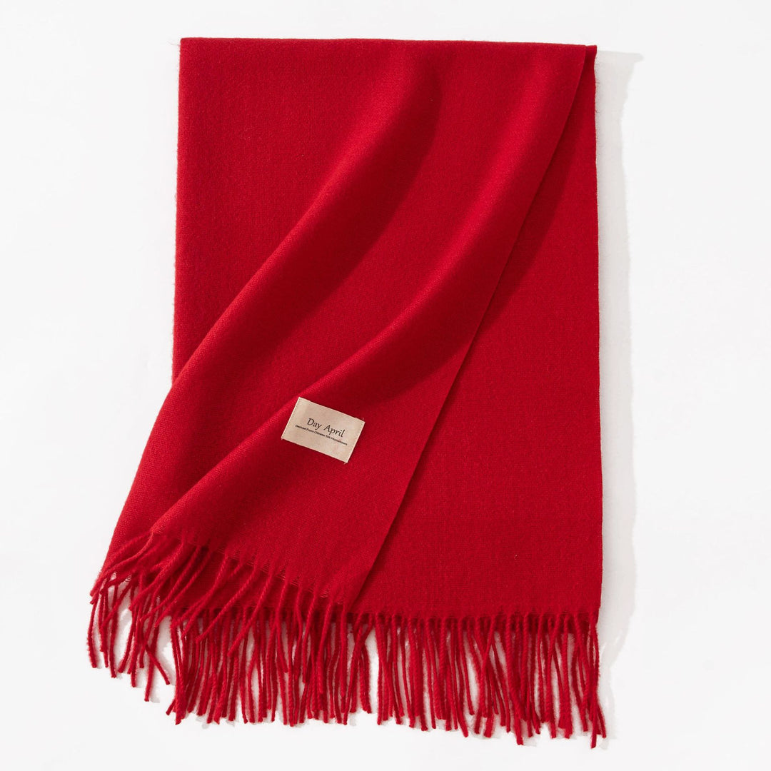 Woman wearing wide soft shawl scarf