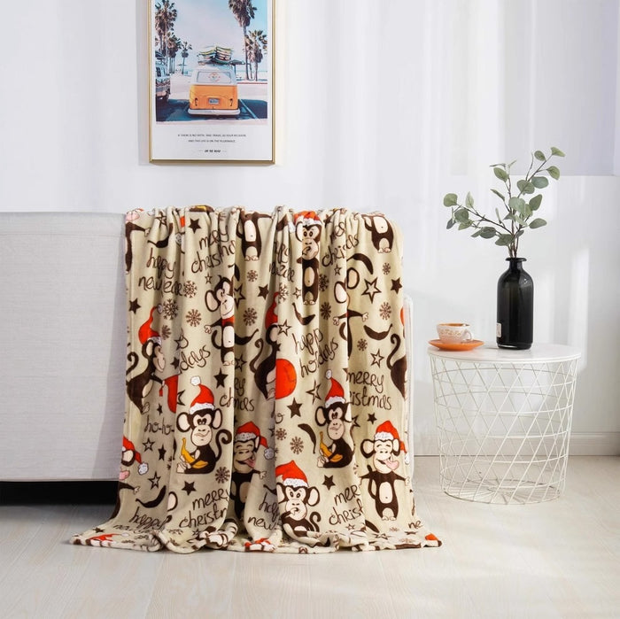 Warmfell Christmas flannel throw with festive prints