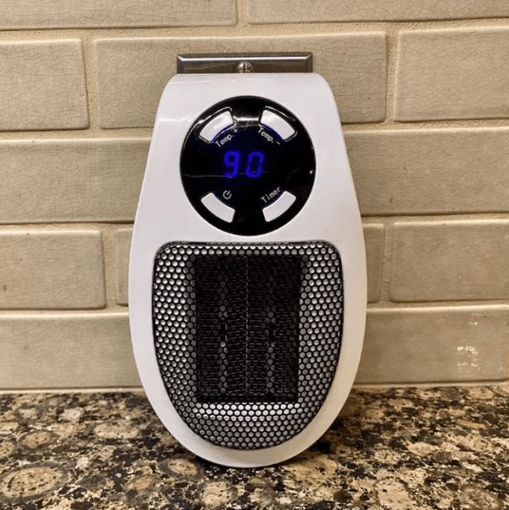 Warmfell™ Compact 500W Electric Heater with Thermostat Control